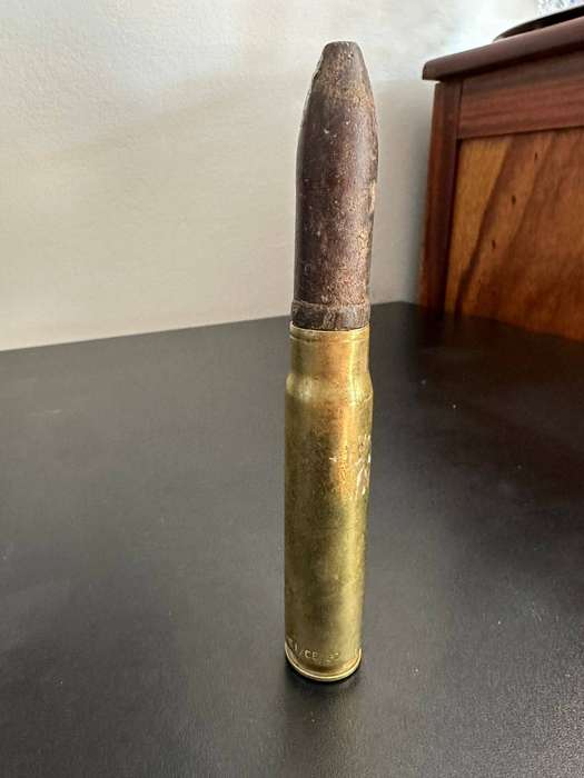 20mm. Round. Deactivated. Height 18 cm.