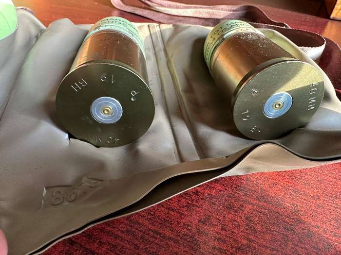 Disposable 40mm. grenade belt with grenades. (All deactivated.)