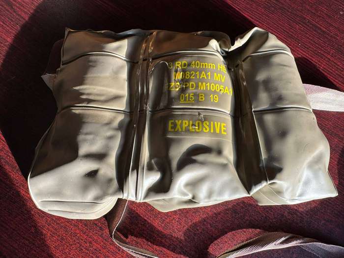 Disposable 40mm. grenade belt with grenades. (All deactivated.)