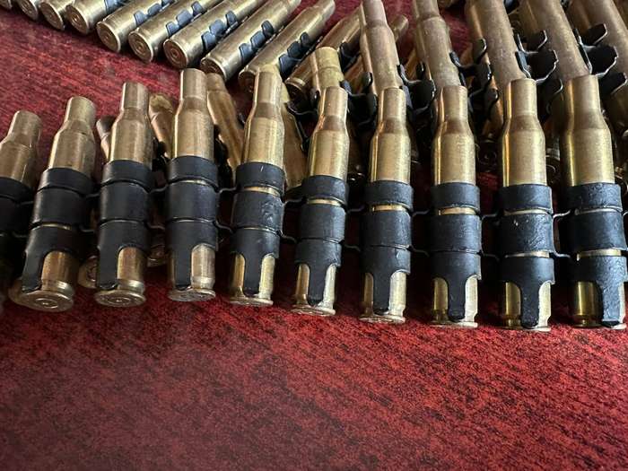 Spent machine gun belt. Total length 1,920 meter. This is in a good condition with no rust.