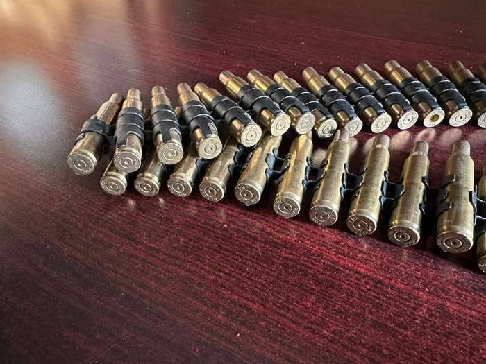 Spent machine gun belt. Total length 1,920 meter. This is in a good condition with no rust.