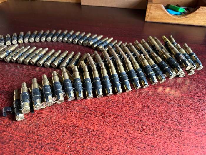 Spent machine gun belt. Total length 1,920 meter. This is in a good condition with no rust.