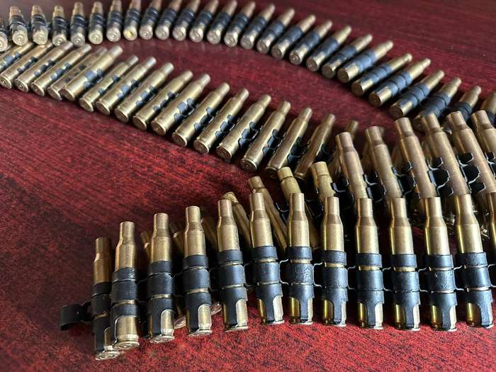 Spent machine gun belt. Total length 1,920 meter. This is in a good condition with no rust.