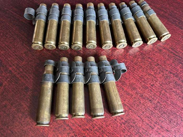 12,7 M4 machine gun belts. 2 Pieces with spent cartridges.