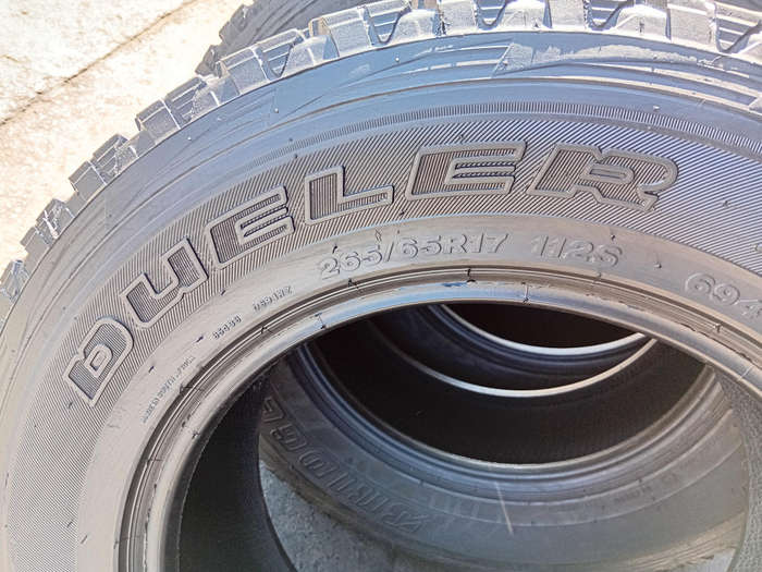 265/65/17 × 4  Bridgestone Dueler with 80% thread life