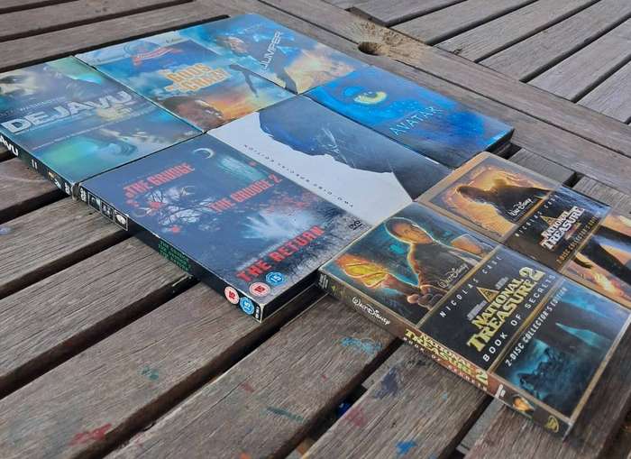 8 x Hard Cover Dvd Movies