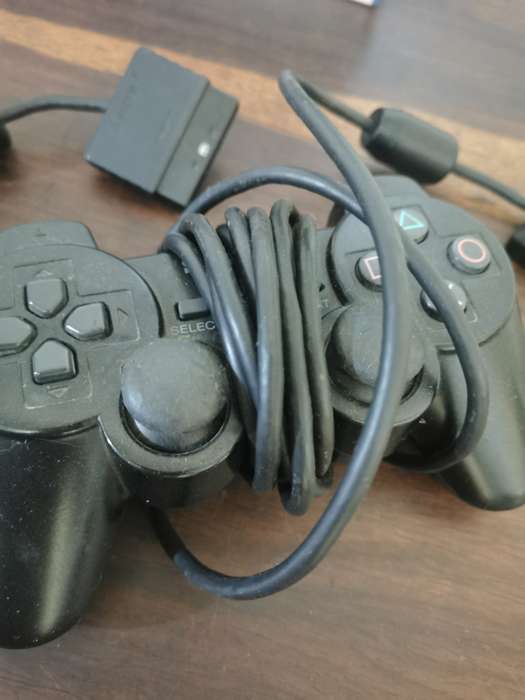 PlayStation 2 Console with Memory Card, Controllers and 7 Games