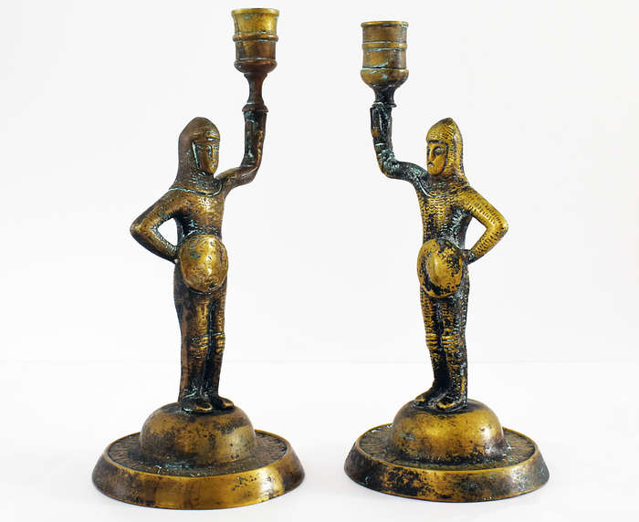 Pair of vintage solid brass medieval knight candlestick holders