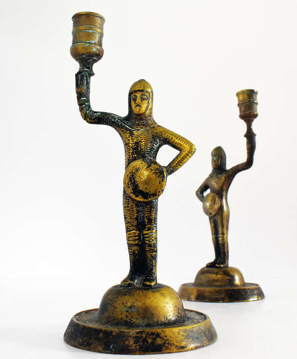 Pair of vintage solid brass medieval knight candlestick holders