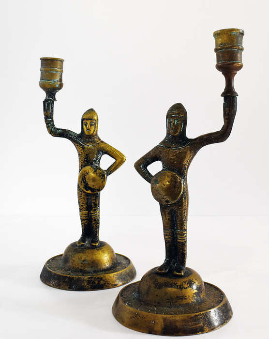 Pair of vintage solid brass medieval knight candlestick holders
