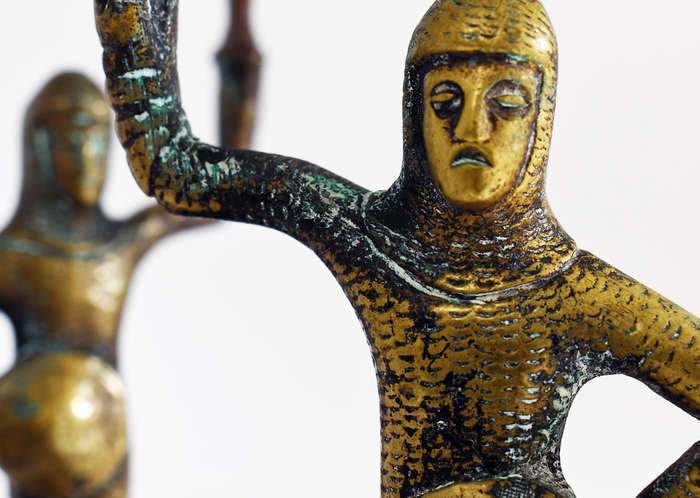 Pair of vintage solid brass medieval knight candlestick holders