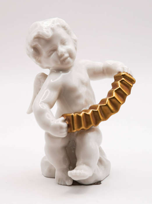 Hutschenreuther Selb LHS porcelain cherub with gilt concertina, Germany c.1950s