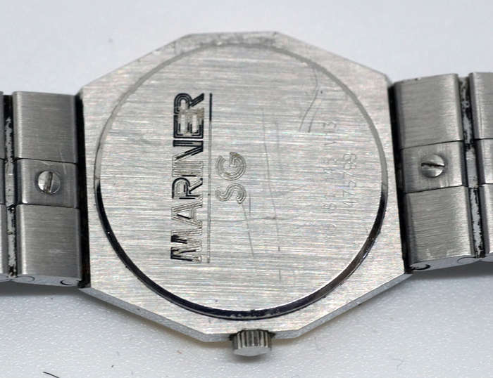 concord mariner ladies watch with solid 18K gold bezel and 18k nugget on buckle