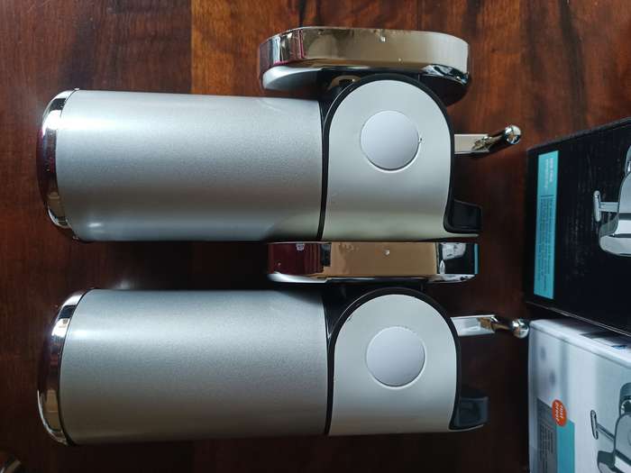 Two shampoo and soap dispensers in boxes, never been used