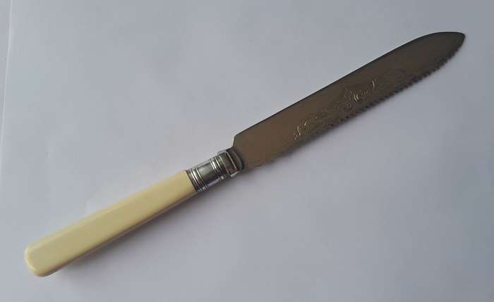 Vintage Sheffield Silver Plated Cake Knife With "Improved Saw Edge". In Original Box.