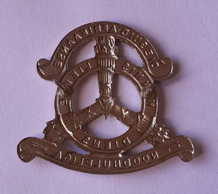 SA Noodhulp Liga Cap Badge.  Pins Intact.