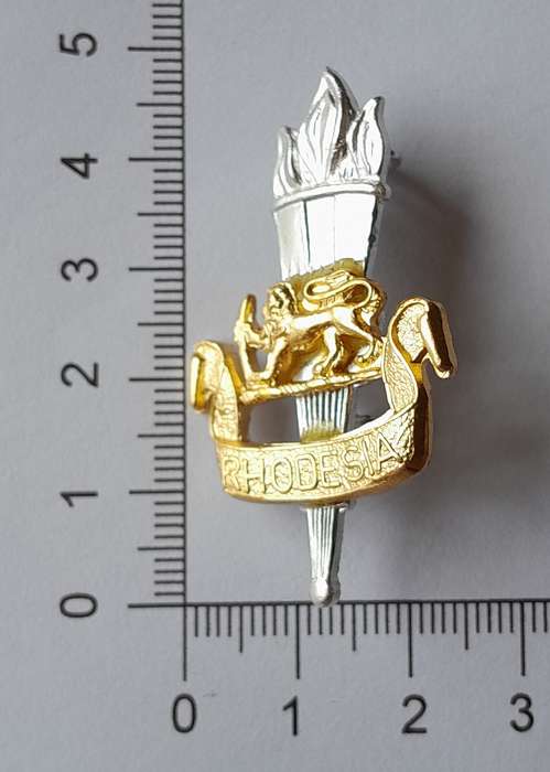Rhodesian Army Education Corps Cap Badge.  Lugs Intact.