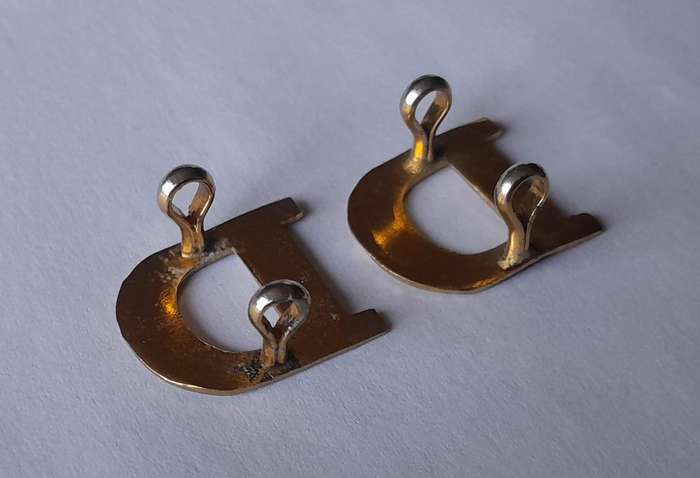Vintage Pair "D" Company Shoulder Titles.  Lugs Intact.