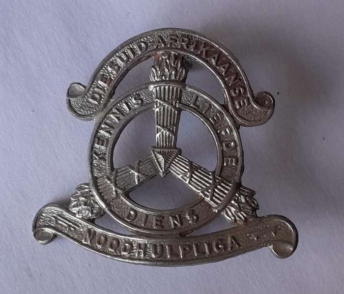 Early Suid Afrikaanse Noodhulp Liga Badge.  Lugs Intact.
