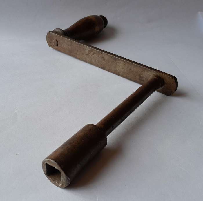 Antique Hand Crank With Turned Wood Handle.