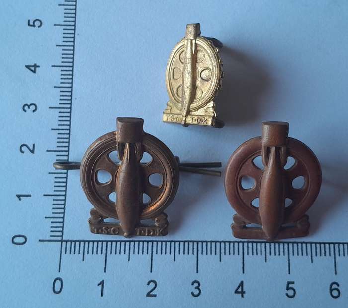 Pair WW2 SA Army Technical Corps Collar Badges + 1 other.  Lugs Intact.