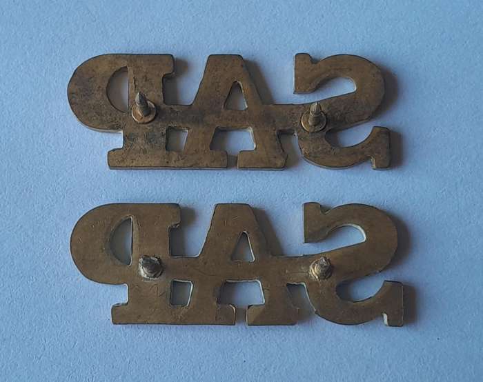 Pair Vintage SA Police Metal Shoulder Titles.  Pins Intact.