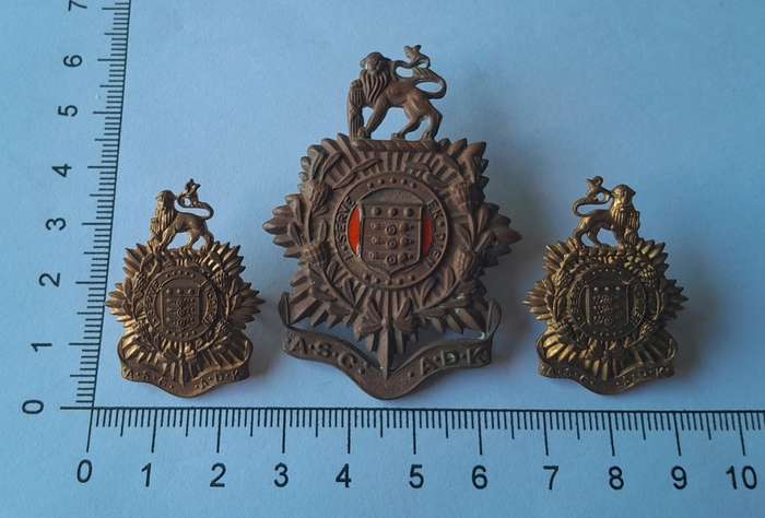 Early SA Army Service Corps Badge Set.  Cap & 2 Collars. (facing).  Lugs Intact.
