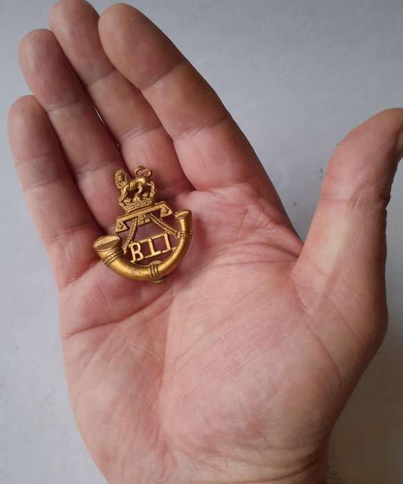 Early SA Army Rand Light Infantry Cap Badge.  Screw Lugs Intact.