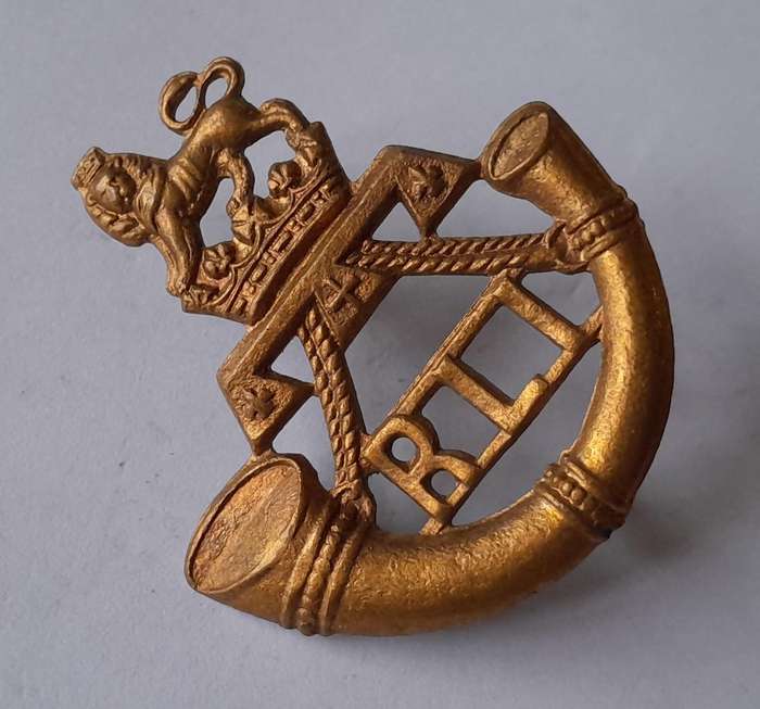 Early SA Army Rand Light Infantry Cap Badge.  Screw Lugs Intact.