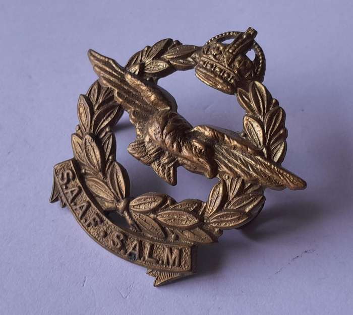 WW2 SA Air Force Cap Badge (Light Bronze).  Lugs Intact.