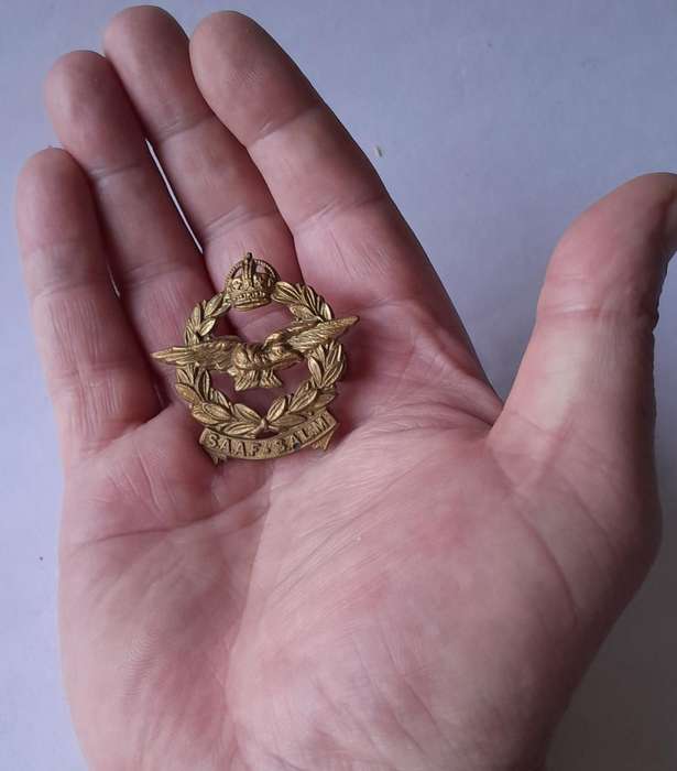 WW2 SA Air Force Cap Badge (Light Bronze).  Lugs Intact.
