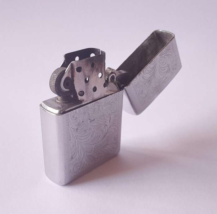 Vintage Zippo Lighter With Engraved Case.