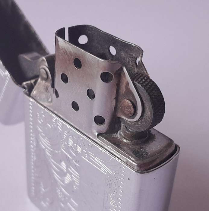 Vintage Zippo Lighter With Engraved Case.