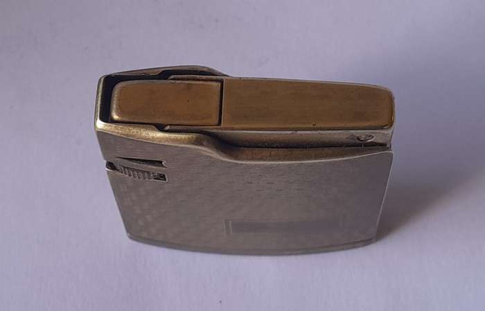 Vintage Japanese "Polka" Goldtone Butane Gas Lighter.