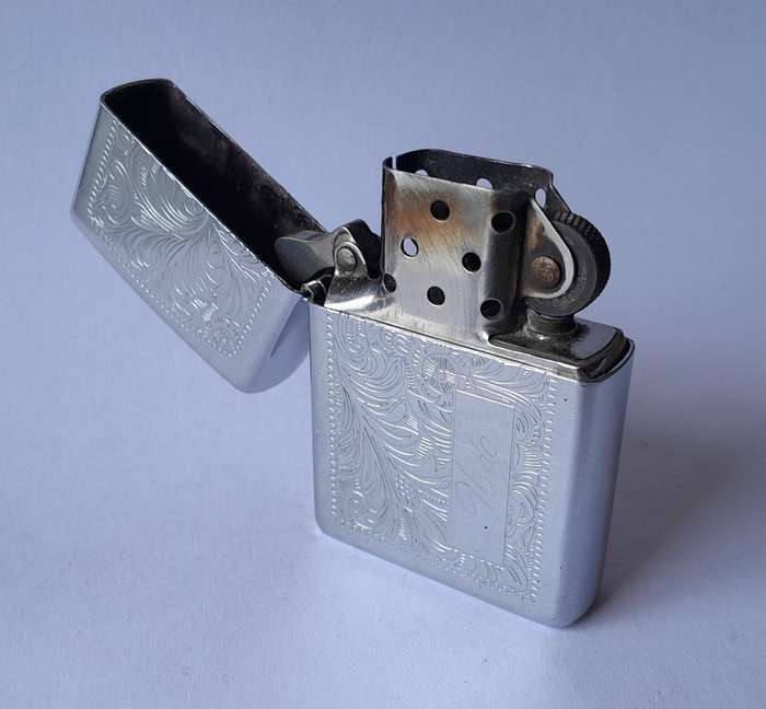 Vintage Zippo Lighter With Engraved Case.