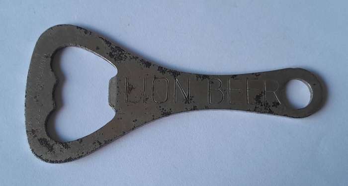 Vintage "Lion Beer" / "Lion Bier" Metal Bottle Opener.