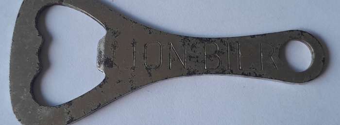 Vintage "Lion Beer" / "Lion Bier" Metal Bottle Opener.
