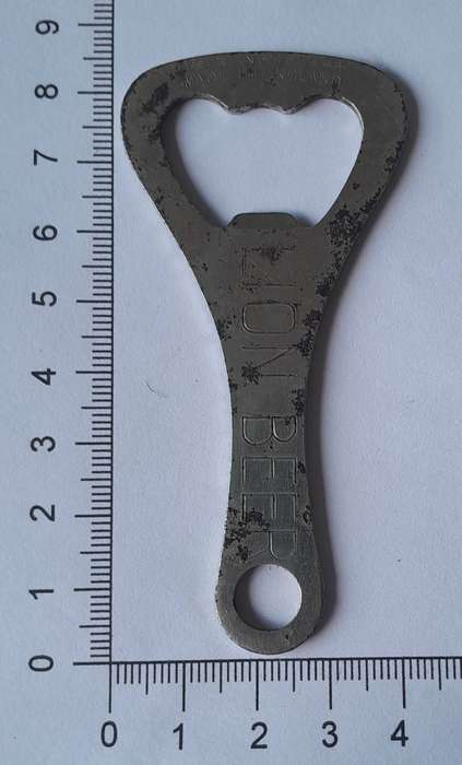 Vintage "Lion Beer" / "Lion Bier" Metal Bottle Opener.