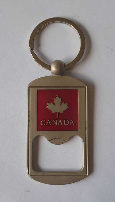 Brushed Steel & Enamel Canada Bottle Opener Key Ring.  Like New.