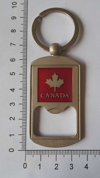 Brushed Steel & Enamel Canada Bottle Opener Key Ring.  Like New.