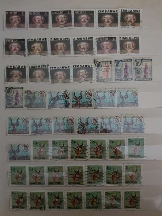 RHODESIA STAMPS USED (BID PER PAGE ,1 BID FOR ALL )