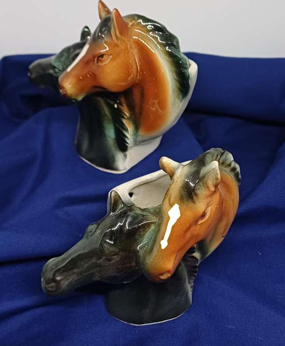 Two horse vase wall hangings