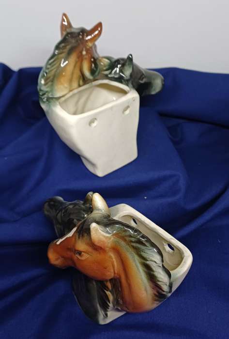 Two horse vase wall hangings