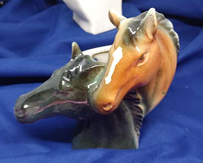 Two horse vase wall hangings