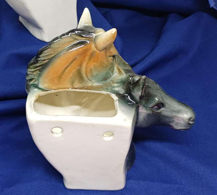 Two horse vase wall hangings