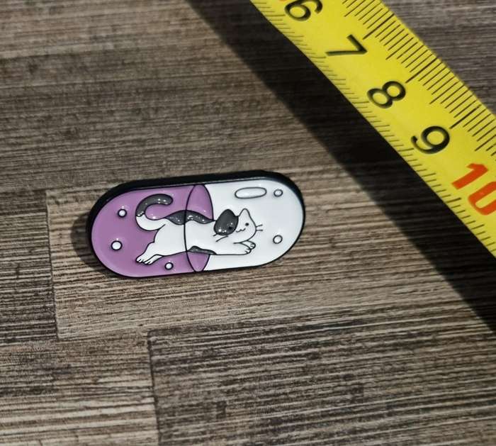 Cat in a Pill Enamel Pin