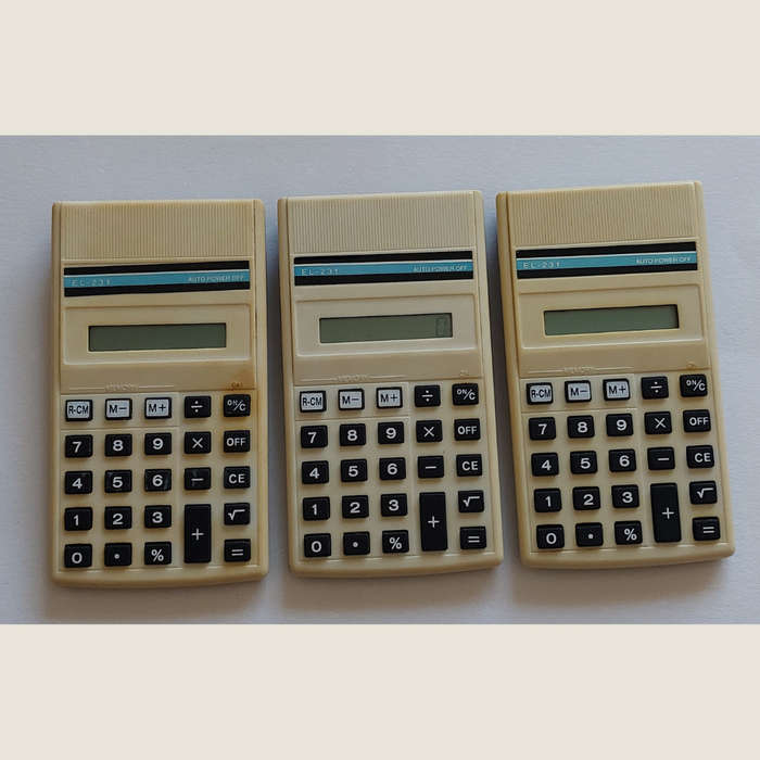 Three old Sharp EL-231 Calculators