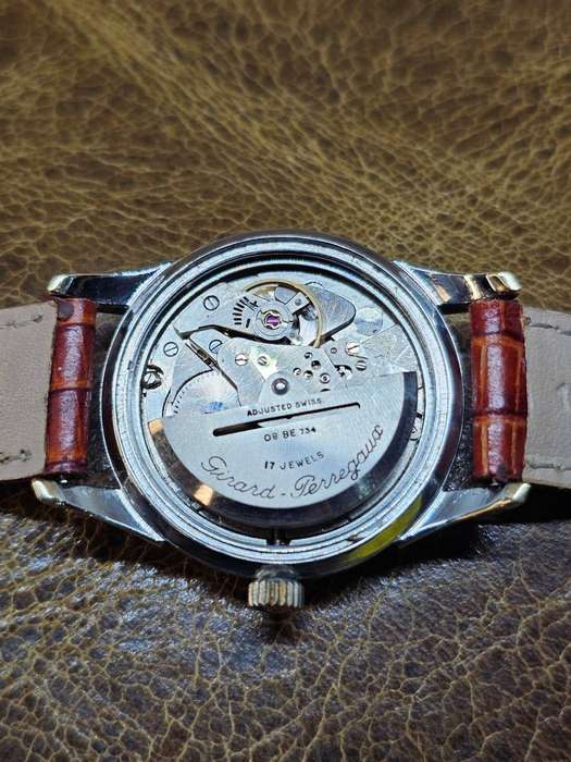A very Rare 1950s Girard Perregaux Gyromatic with a solid gold bezel.