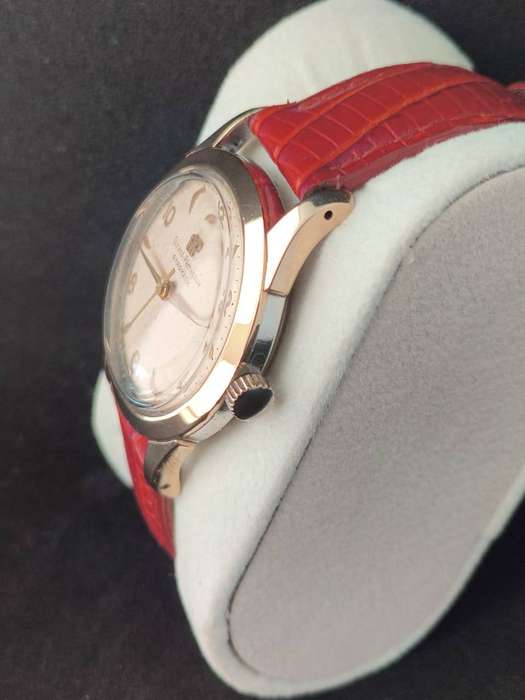 A very Rare 1950s Girard Perregaux Gyromatic with a solid gold bezel.