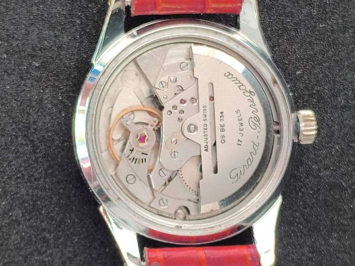 A very Rare 1950s Girard Perregaux Gyromatic with a solid gold bezel.